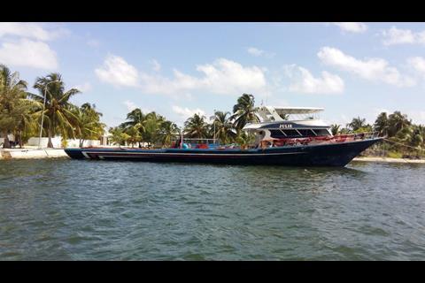 One of Julie’s crew with the bird-tracking radar supplied by Furuno
